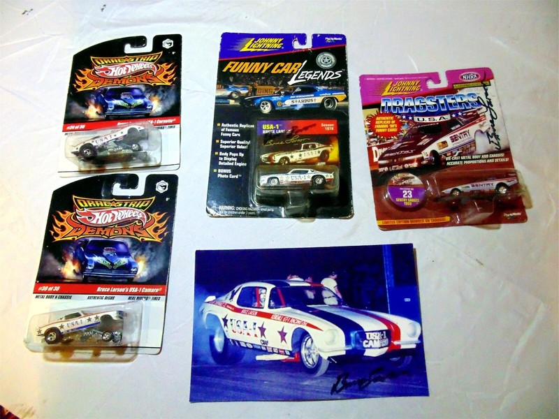 VINTAGE COLLECTION OF AUTOGRAHED DIECAST & PHOTOS OF BRUCE LARSON