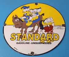 VINTAGE STANDARD GASOLINE PORCELAIN DUCKS WALT DISNEY GAS OIL PUMP PLATE SIGN