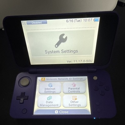 Nintendo 2DSXL Purple Handheld System w/ two physical games.