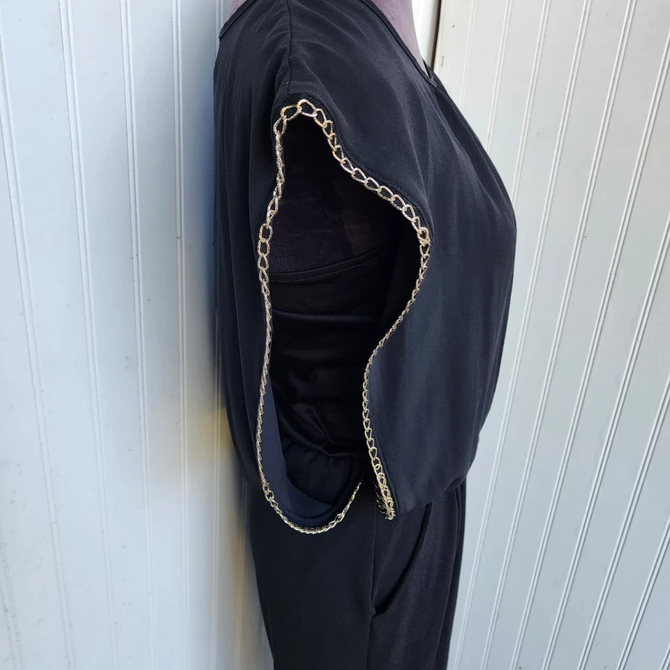 Mono negro con detalle de cadena transparente manga gorra elástico BCX para mujer talla S Foto 4 de 4