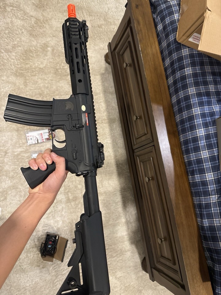 Airsoft Gun(350 fps), 2 Batteries, A Charger And Magazine. In Original