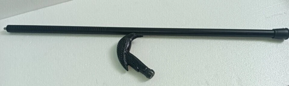 Bastón táctico antiguo de acero inoxidable con mango de cabeza de cuervo de latón negro Foto 2 de 4