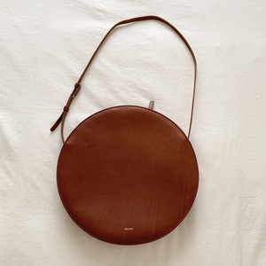 brown round bolsa