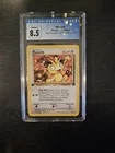 CGC 8.5 Meowth 1st Edition Team Rocket 62/82 Pokemon Near Mint/Mint