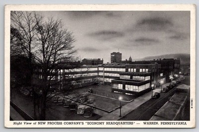 Warren PA New Process Co Economy Headquarters at Dusk Curteich Postcard 1950s