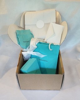 Tiffany & Co original empty packaging blue bag box filling pouch ribbon.