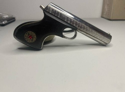 ITK pistol lighter. Handcrafted by Prison Works.