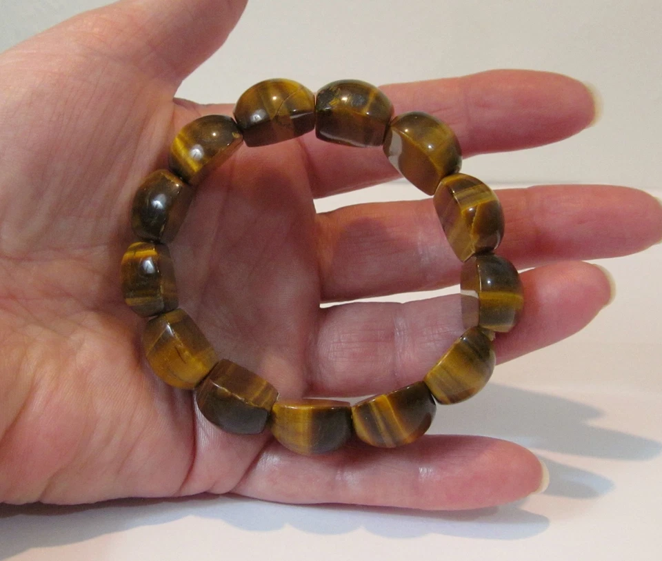 Pulsera elástica de azulejo medio ovalado tallado ojo de tigre se adapta a muñeca de tamaño promedio 7,25" Foto 3 de 4