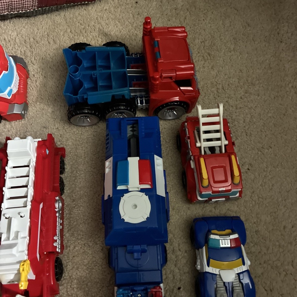 transformers rescue bots lot optimus prime chase heatwave boulder and ...
