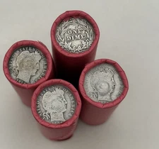 TIGHTLY CRIMPED RED BANK WRAPPED ROLLS OF WHEAT CENTS WITH BARBER DIMES SHOWING