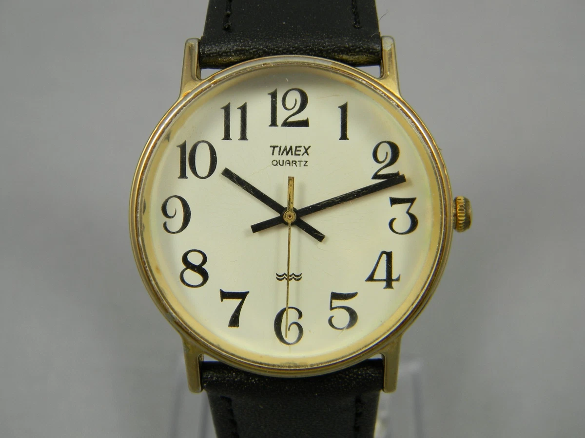 Vintage 1976 Timex Gold Tone Women\'s Quartz Watch Black Leather Band 18mm Vintage Womens Watch Gold Tone Timex Electric 1976 on Blue  main image 2