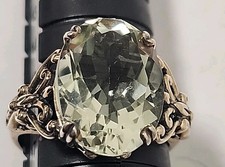THAILAND STERLING SILVER SIZE 8 RING WITH OVAL LIGHT GREENISH STONE