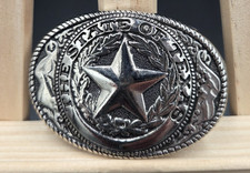 State of Texas silver toned western belt Buckle with carved detail.