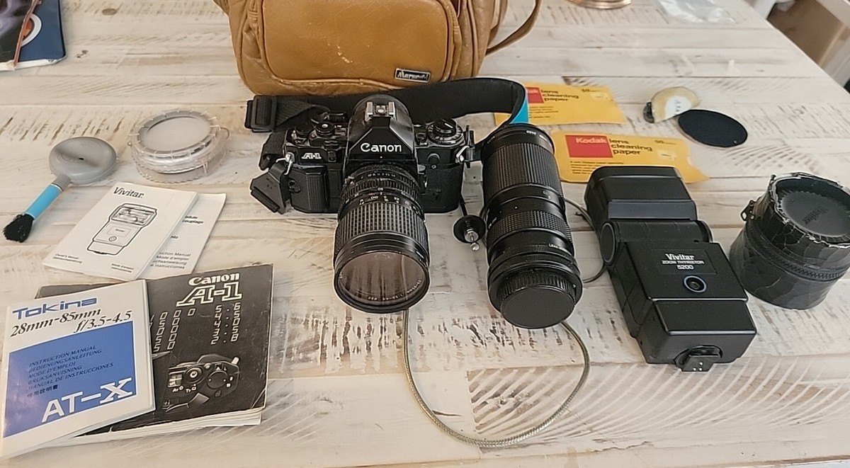 Canon A1 35mm film camera + 58mm, 62mm SL-1A, 100-200mm 2x, Strap