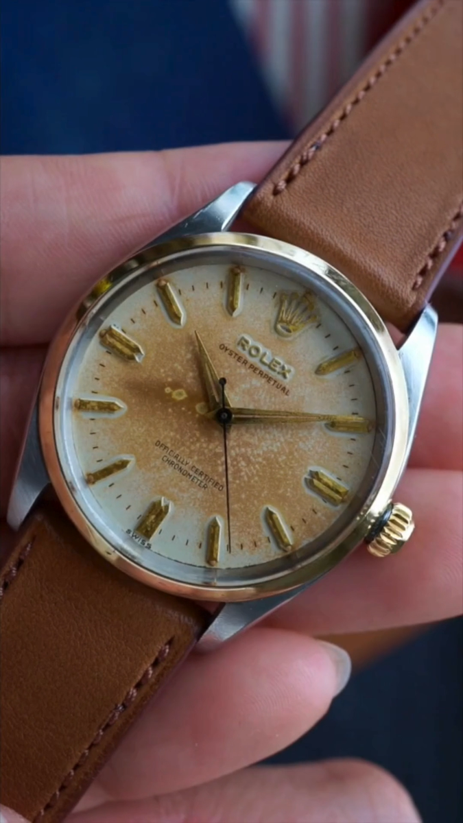 Rolex Oyster Perpetual 6564 Steel/18k Gold Tropical 34 mm