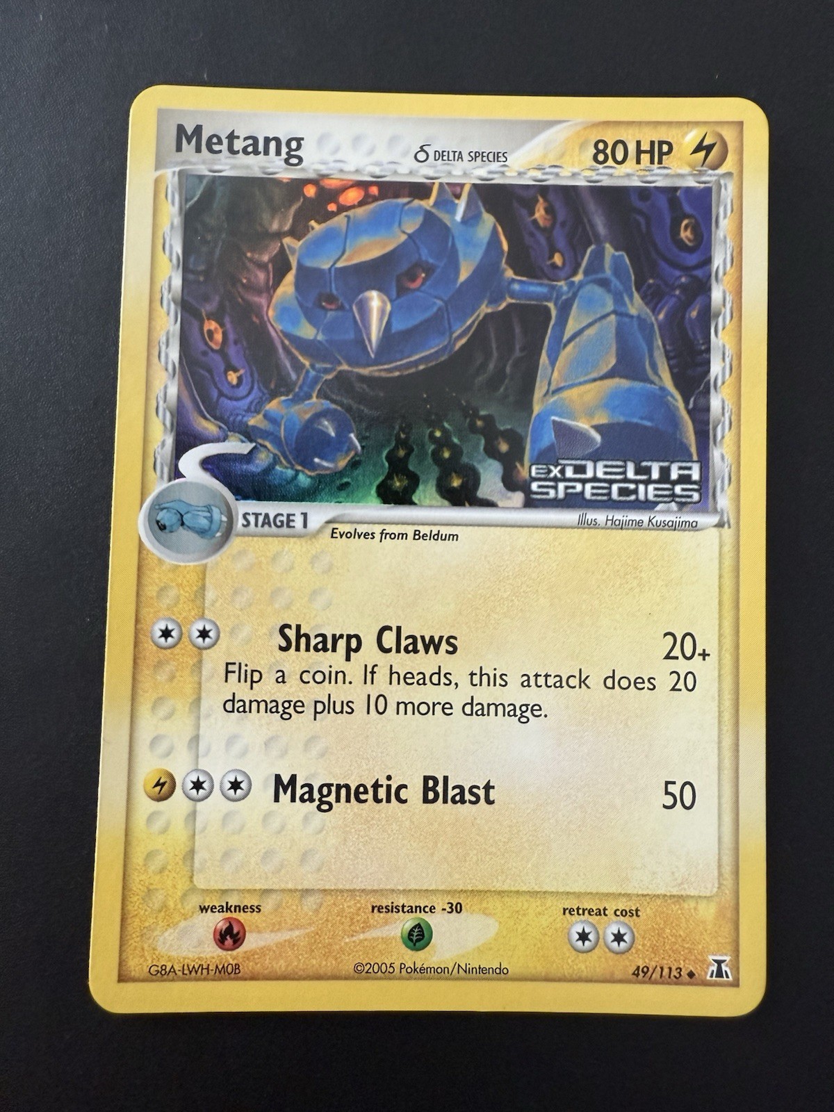Pokemon TCG 2005 Delta Species Metang 49/113 Reverse Stamped Holo Mint