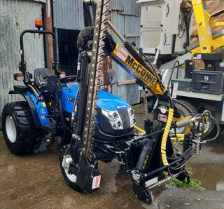 Compact tractor solis 26 with McConnel hedge cutter