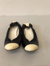 Chic Vintage Chanel Black and Cream Ballet Flats