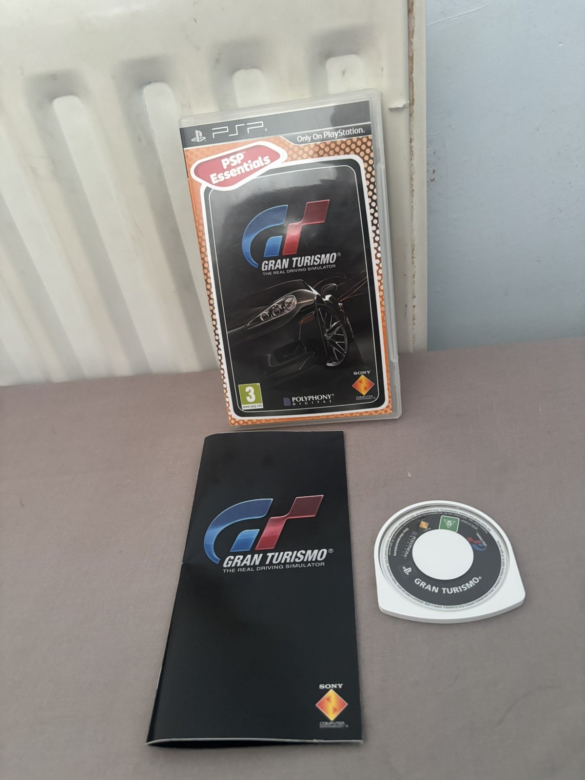 Gran Turismo - Platinum Edition (Sony PSP 2010) Video Game Complete with Manual.