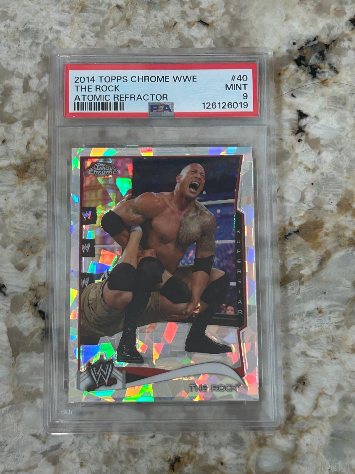 The Rock 2014 Topps Chrome WWE Atomic Refractor PSA 9
