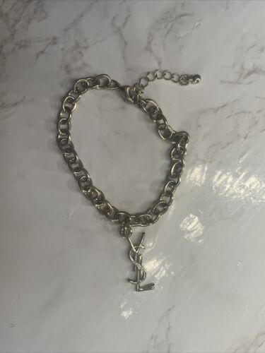 Beautiful Vintage Yves St Laurent (YSL) Bracelet with YSL Charm logo - Picture 1 of 2