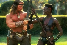 Grace Jones and Arnold Schwarzenegger in Conan 4x6 Picture Celebrity Print
