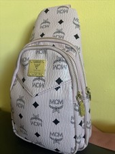MCM Tan Monogram Sling Bag Visetos monogram Color: Pink