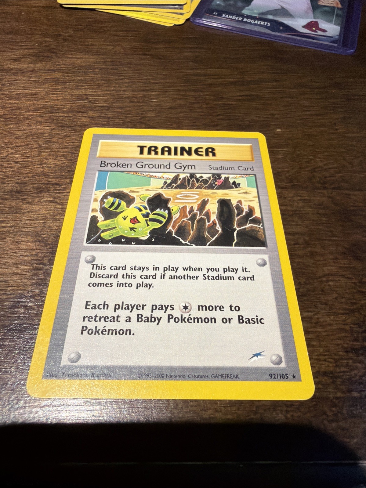 Broken Ground Gym 92/105 Neo Destiny Regular