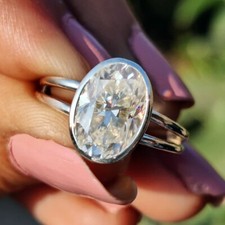 Bezel Set Oval Moissanite Double Band Engagement Ring In 14K White Gold Plated
