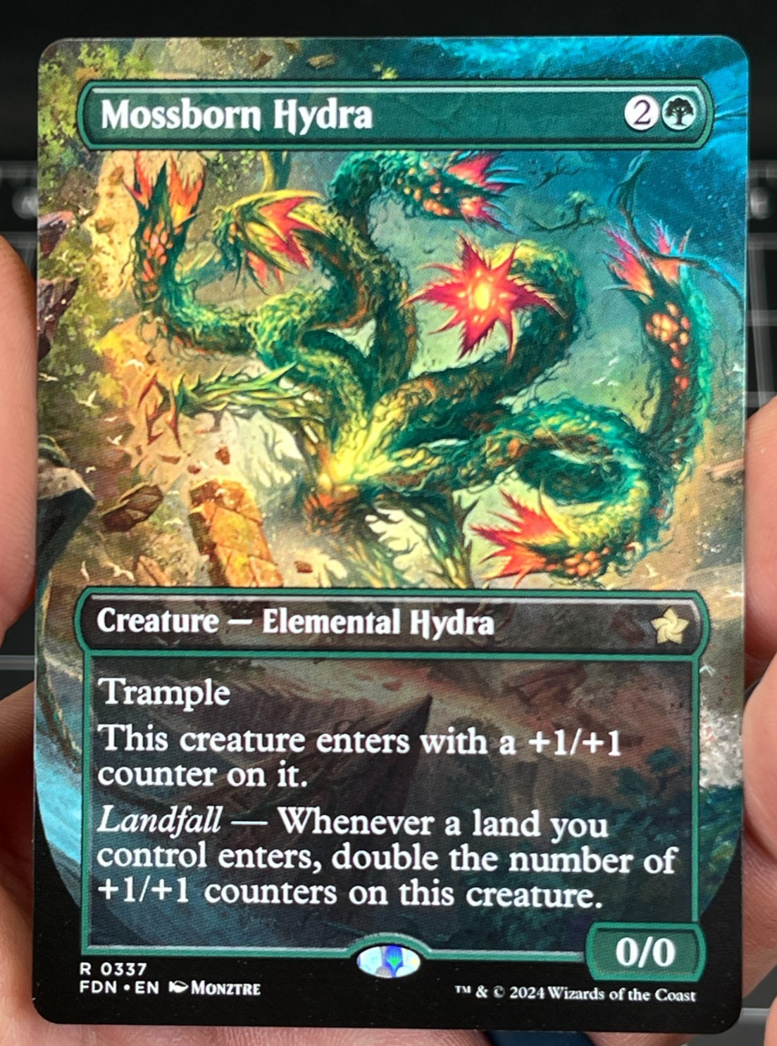 Mossborn Hydra (Borderless) #337 (NM) Foundations FDN Magic MTG