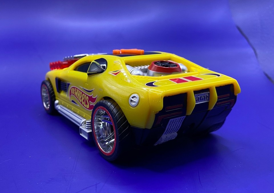 HOT WHEELS Pop Racer Car Toy Yellow Makes Sounds Lights Up Pops Wheelies eBay