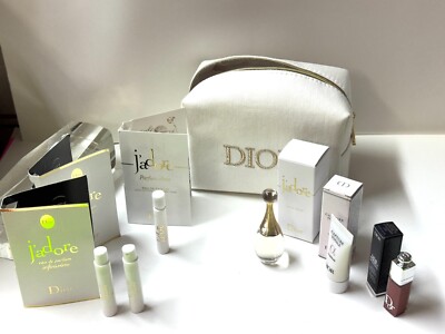 set  J'adore Parfum   0.17 oz  with bag and more .