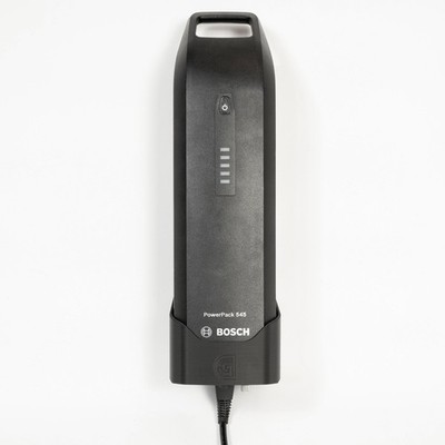 E-bike wall mount suitable for Bosch PowerPack battery - calibration sliding and charging