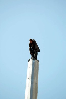 Master Mystifier David Blaine stands 100 feet above the ground for- Old Photo