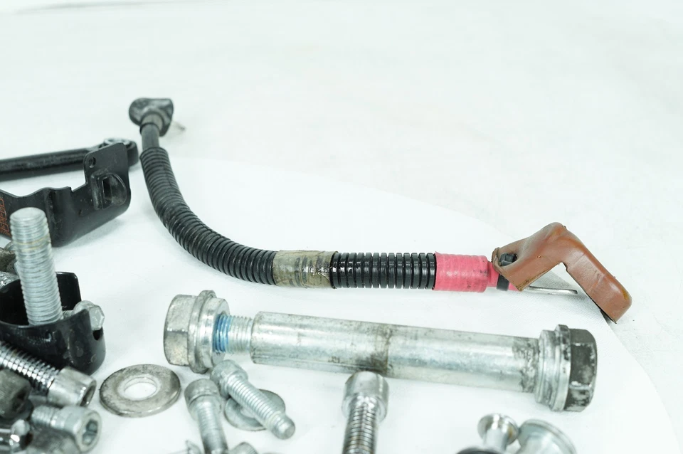 13 Harley Sportster 883 OEM Hardware Bolts Nuts Brackets Positive Battery Cable - Image 2 of 4