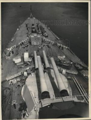 #ad 1960 Press Photo Men Stripping HMS Vanguard for Scrap Sunbathe on Deck $24.99