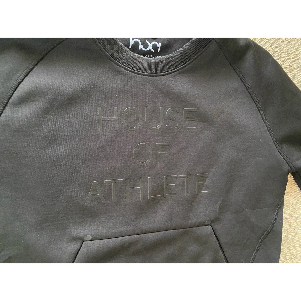 Suéter negro cuello redondo logotipo polar tecnológico unisex de CASA DE ATLETA S Foto 3 de 4