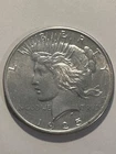 1925 UNCIRCULATED US Peace Silver Dollar       N549