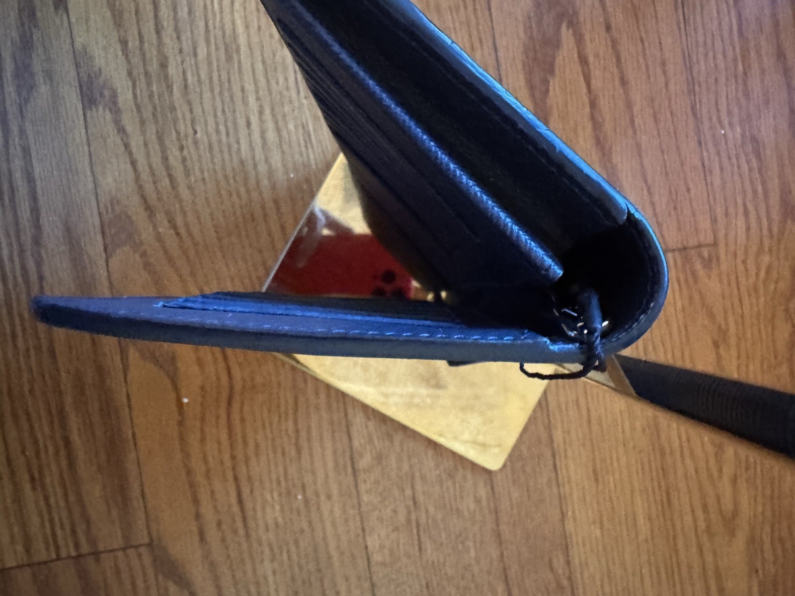 louis vuitton brazza wallet Black  And Orange Large Will Hold Your Passport. image 6