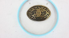 Vintage oval etched belt buckle in antique brass