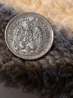 This is a copper 1 Centavo coin from Mexico, minted in 1897.The reverse features — photo 1
