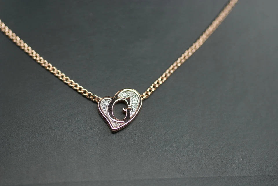 GUESS Damen Halskette UBN71538 G roségoldfarben Kette weißer Besatz Herz NEU - Bild 3 von 3