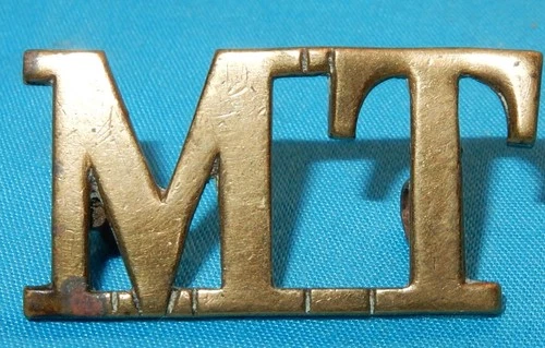 WW1 ERA MT MOTOR TRANSPORT CORPS MILITARY SHOULDER TITLE BADGE ROUND LUGS