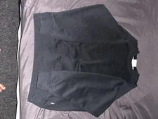 plain black crewneck sweatshirt, a versatile basic apparel