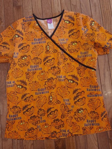 Disney Women Sz M Orange Trick or Treat Cheshire Cat Halloween Scrub Top