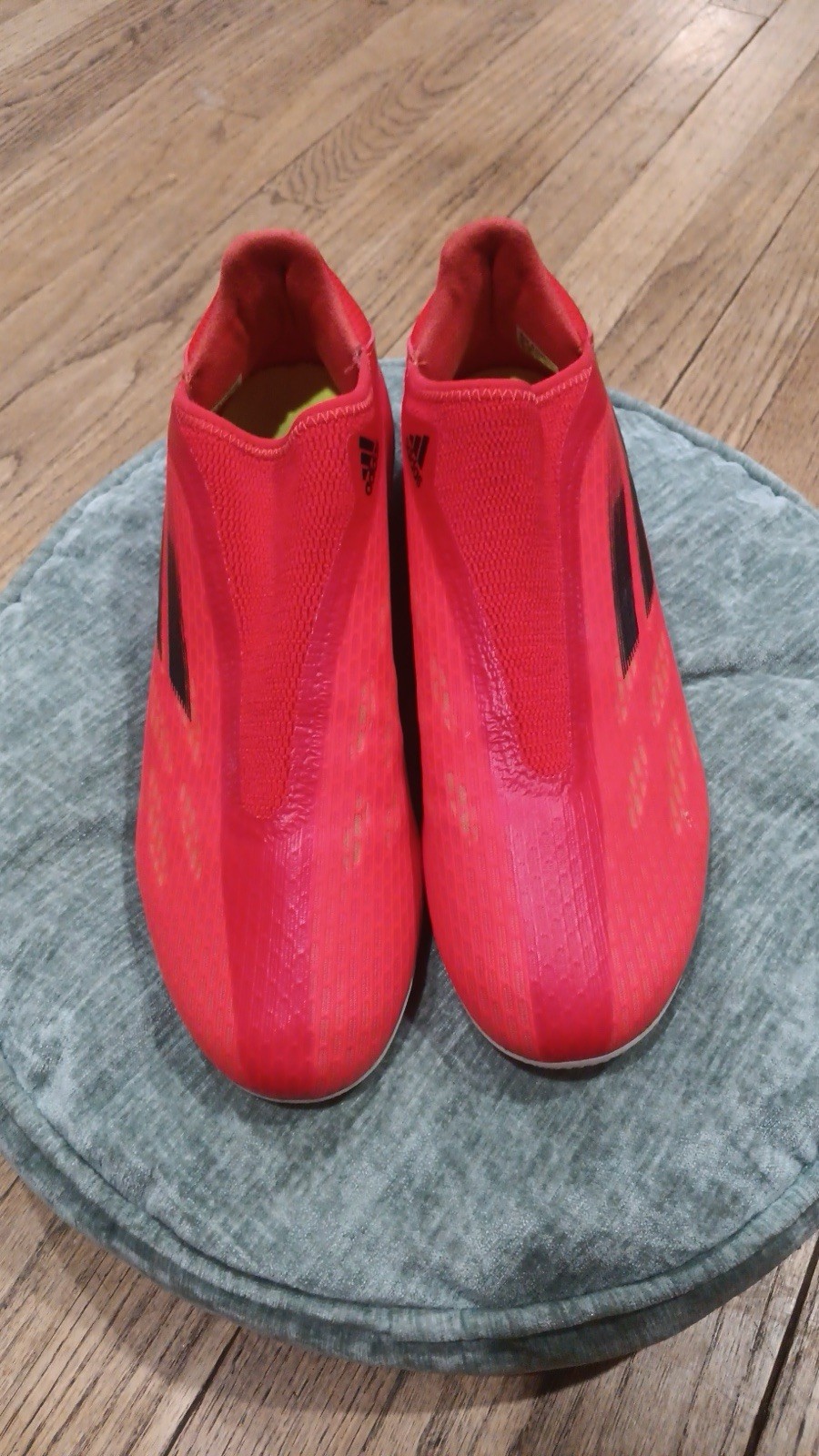 Adidas Speed Flow Lace-up soccer boots for firm ground, red,