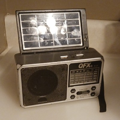 QFX R-37 AM/FM Shortwave Radio Solar Panel USB Headphone Jack Silver Black