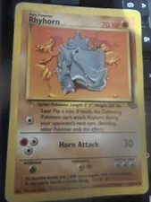Pokemon Rhyhorn #61/64 Rarity Rated Common. Card is in Excellent Condition