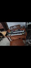 Vintage lowrey organ . complete with bench and two lamps .good condition everyth