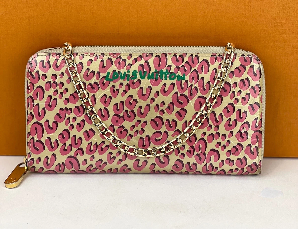 A Louis Vuitton pink leopard Vernis wallet by Stephen Sprouse